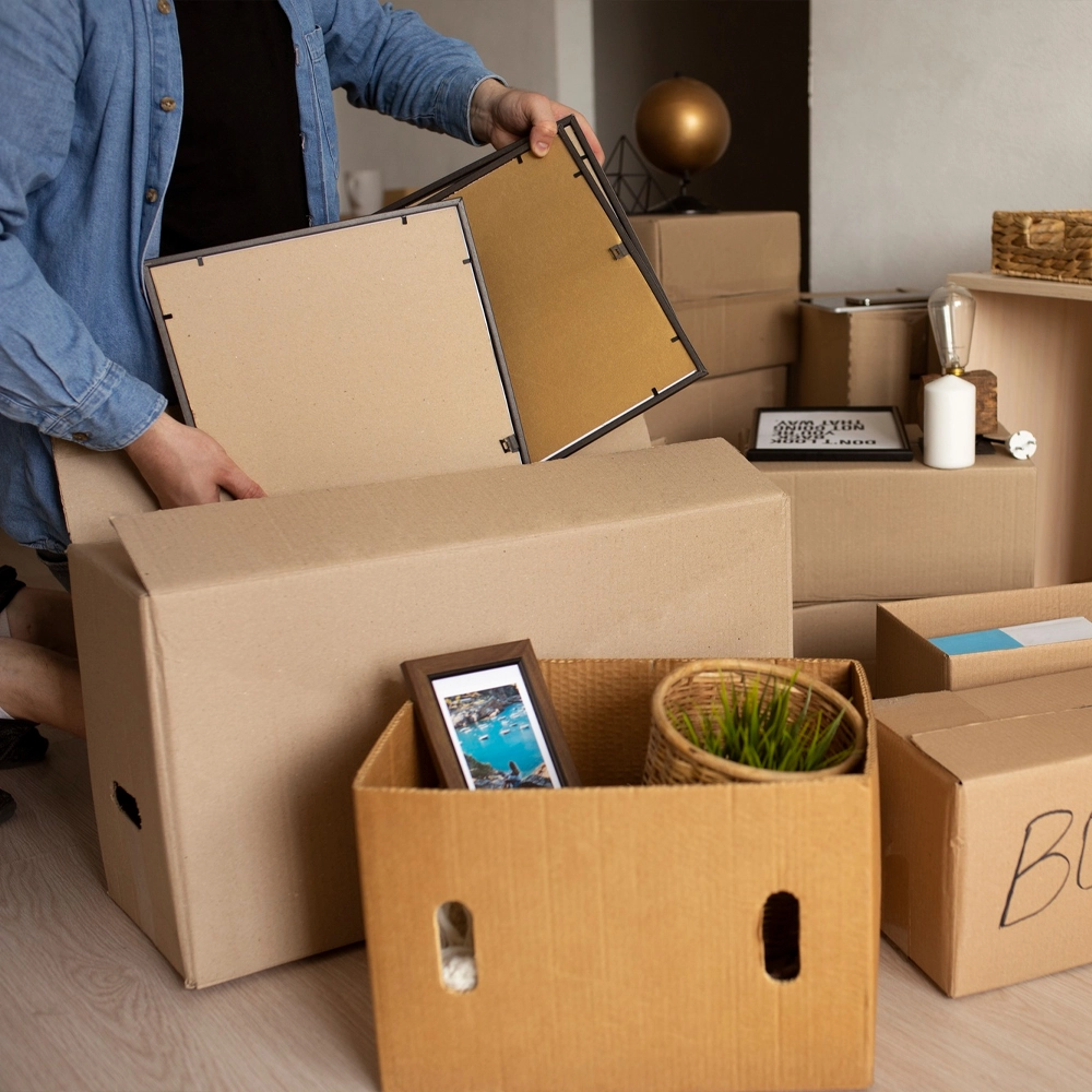 Cardboard boxes being packed